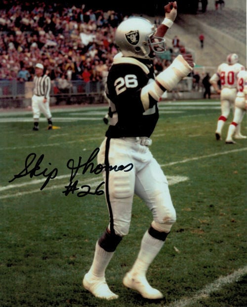 Skip Thomas Signed Oakland Raiders 8x10 Photo (Vertical)-Powers Sports Memorabilia