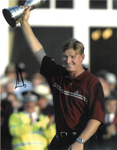 Ernie Els Autographed PGA 11x14 Photo- JSA Hologram #DD32783 (w/ Trophy at 2002 Open Championship)-Powers Sports Memorabilia