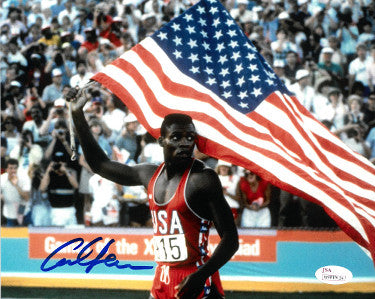 Carl Lewis Autographed Team USA 8x10 Photo (Flag)- JSA Witnessed Hologram (Olympics)-Powers Sports Memorabilia