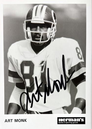 Art Monk Autographed Herman's Sporting Goods Washington 5x7 Photo minor dings- COA (HOF)-Powers Sports Memorabilia