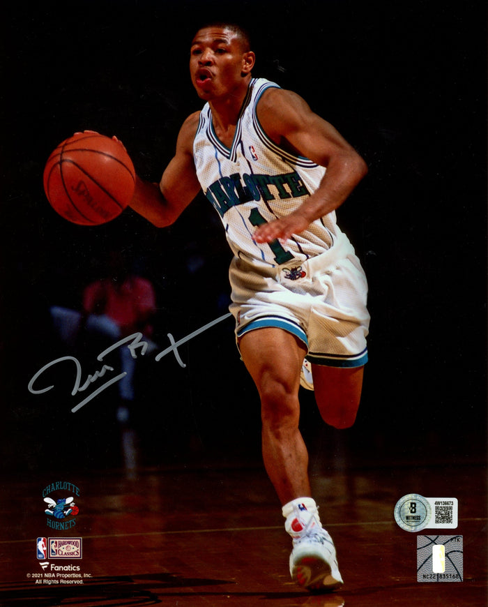 Muggsy Bogues Signed Charlotte Hornets 8x10 Photo – Dribbling – Beckett Witness Authenticated-Powers Sports Memorabilia