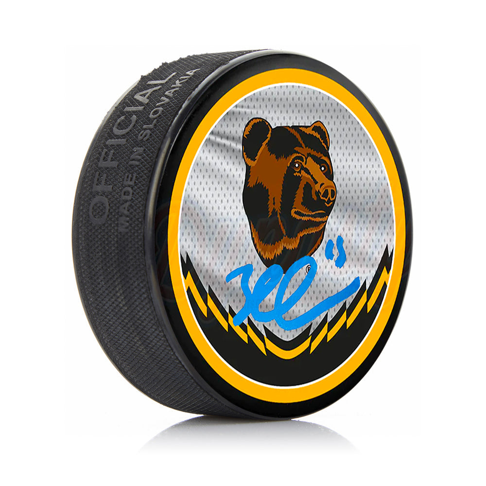 Brad Marchand Boston Bruins Signed 2022 Reverse Retro Hockey Puck-Powers Sports Memorabilia