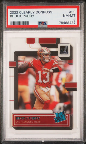 Brock Purdy 2022 Panini Clearly Donruss Football Rookie Card #99 Graded PSA 8-Powers Sports Memorabilia
