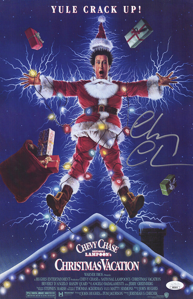 Chevy Chase Autographed Christmas Vacation 11×17 Movie Poster (In Silver) (JSA)-Powers Sports Memorabilia
