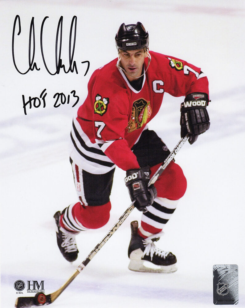 Chris Chelios Autographed Chicago Blackhawks With Puck Action 8x10 Photo with HOF 2013-Powers Sports Memorabilia