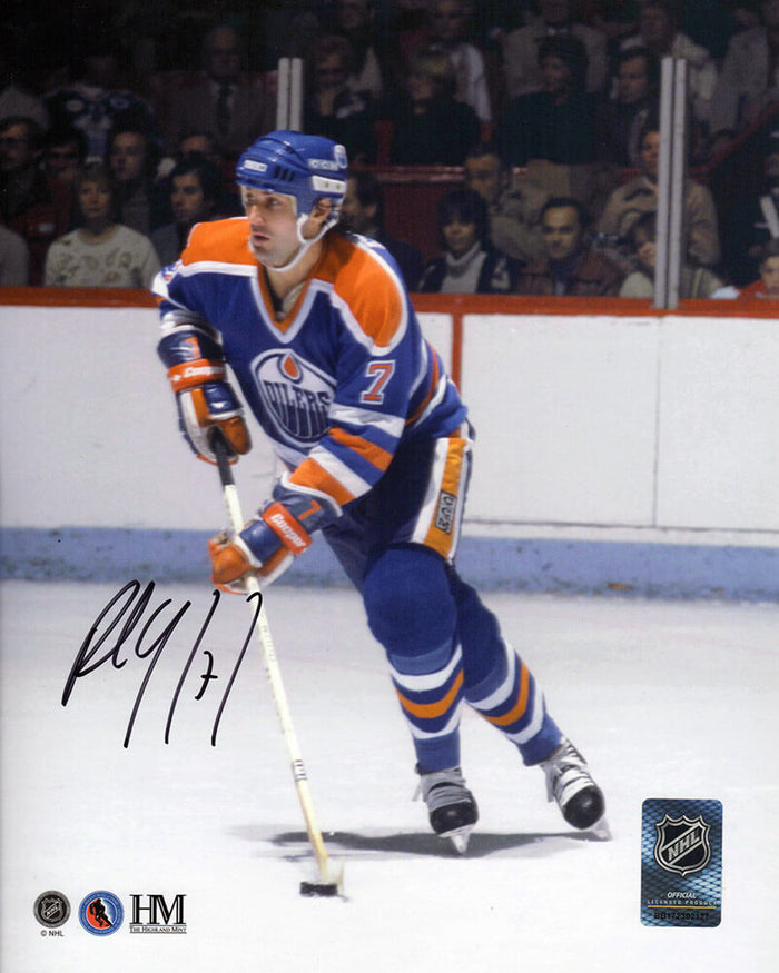Paul Coffey Autographed Edmonton Oilers Blue Jersey Action With Puck 8x10 Photo-Powers Sports Memorabilia