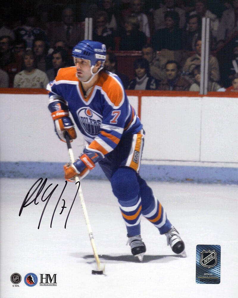 Paul Coffey Autographed Edmonton Oilers Blue Jersey Action With Puck 8x10 Photo-Powers Sports Memorabilia