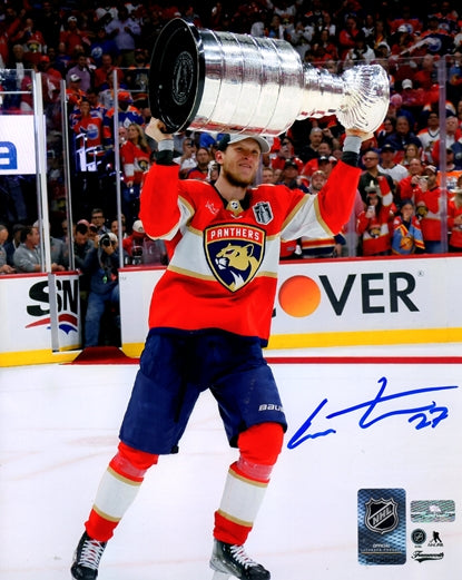 Autographed Eetu Luostarinen Florida Panthers (2024 Stanley Cup Trophy) 8x10 Photo-Powers Sports Memorabilia