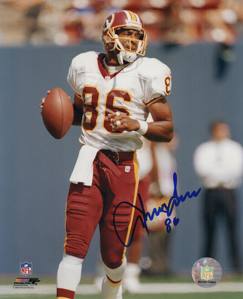 Irving Fryar Autographed Washington Football Team White Jersey With Football 8x10 Photo-Powers Sports Memorabilia