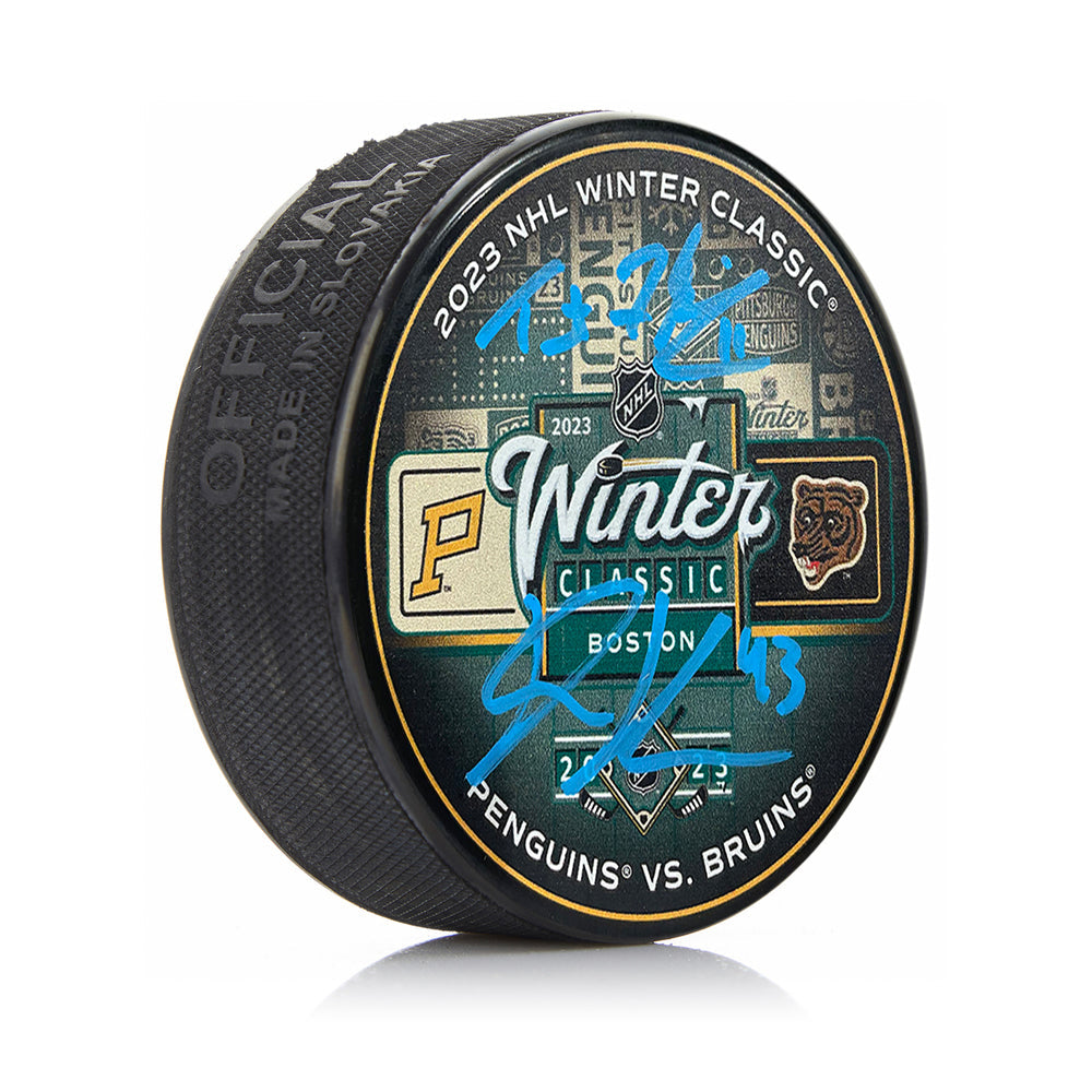Trent Frederic & Danton Heinen Signed Boston Bruins 2023 Winter Classic Hockey Logo Puck-Powers Sports Memorabilia