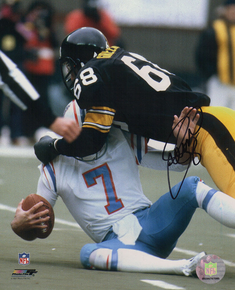 LC Greenwood Autographed Pittsburgh Steelers Black Jersey Tackle 8x10 Photo-Powers Sports Memorabilia