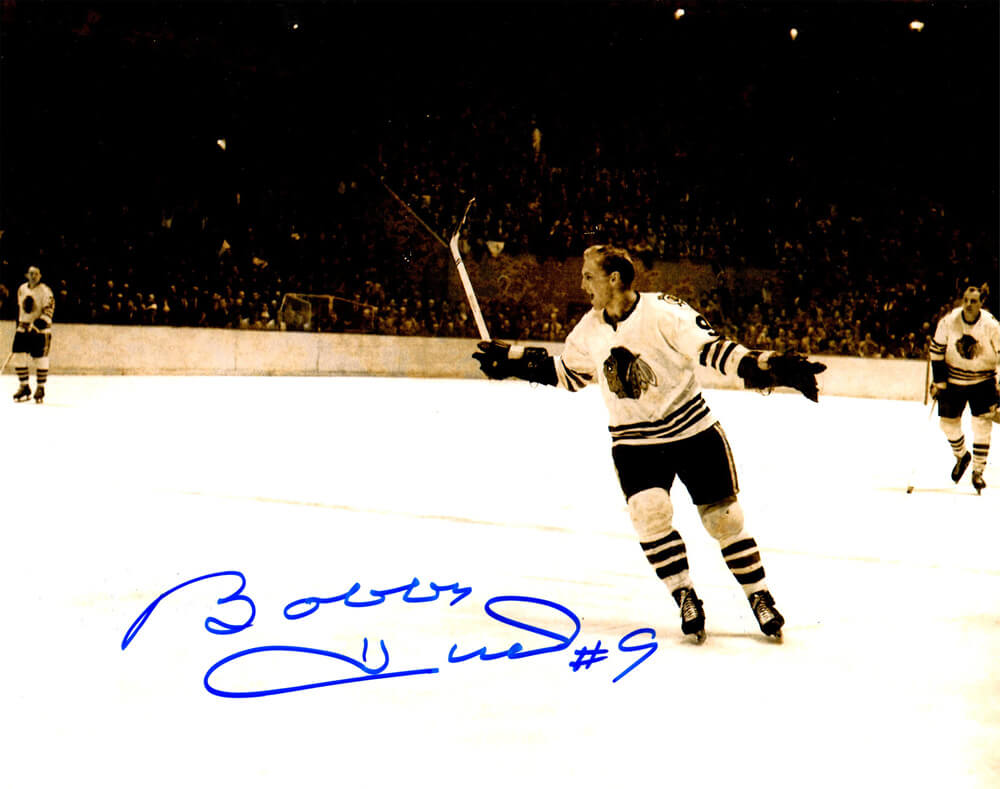 Bobby Hull Autographed Chicago Blackhawks B&W Stick Raised 8x10 Photo-Powers Sports Memorabilia
