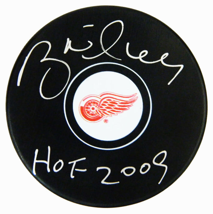 Brett Hull Autographed Detroit Red Wings Logo Hockey Puck with HOF 2009-Powers Sports Memorabilia