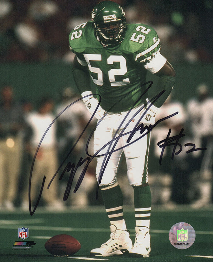 Pepper Johnson Autographed New York Jets Green Jersey Over Football 8x10 Photo-Powers Sports Memorabilia
