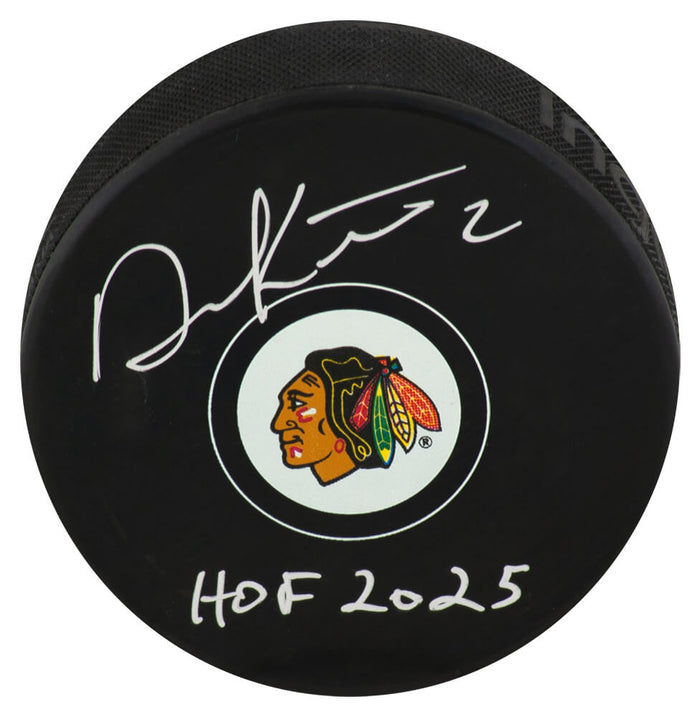 Duncan Keith Autographed Chicago Blackhawks Logo Hockey Puck with HOF 2025-Powers Sports Memorabilia