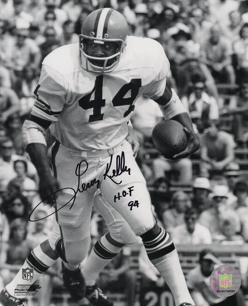 Leroy Kelly Autographed Cleveland Browns B&W With Football Action 8x10 Photo with HOF'94-Powers Sports Memorabilia