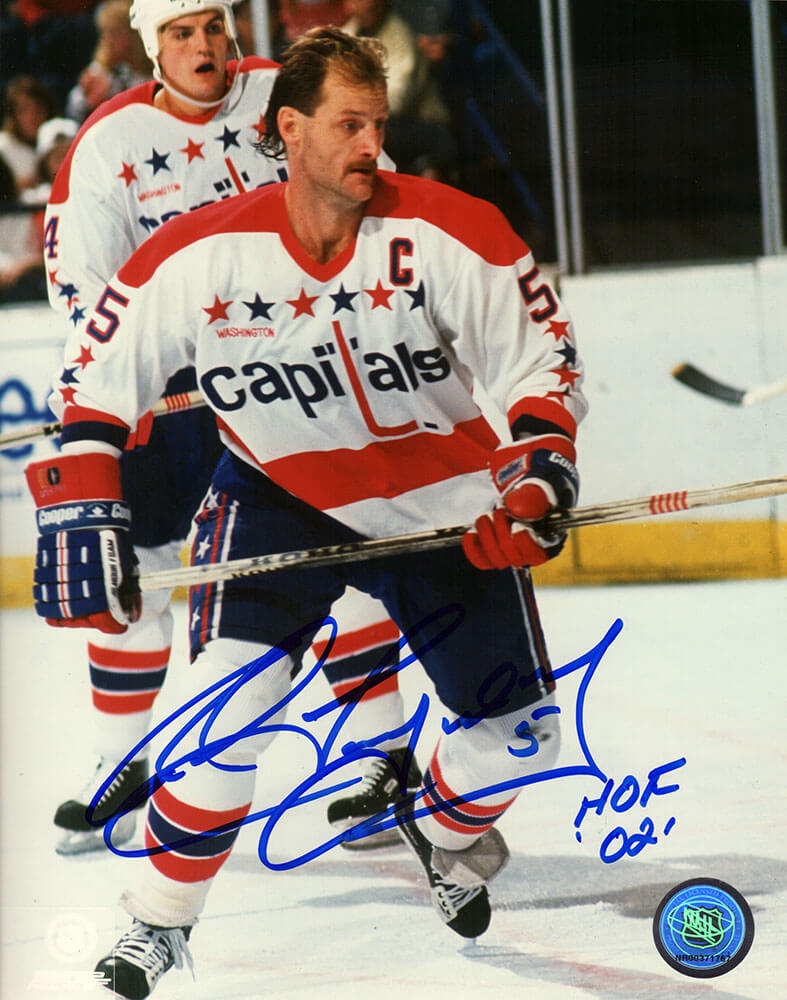 Rod Langway Autographed Capitals White Jersey Holding Stick Action 8x10 Photo with HOF'02-Powers Sports Memorabilia