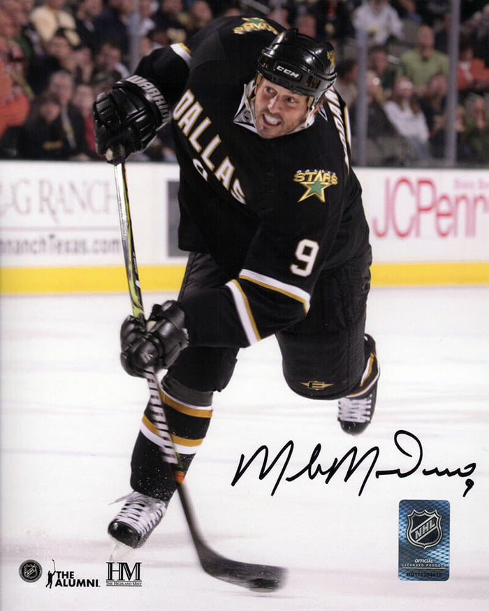 Mike Modano Autographed Dallas Stars Black Jersey Slap Shot Action 8x10 Photo-Powers Sports Memorabilia