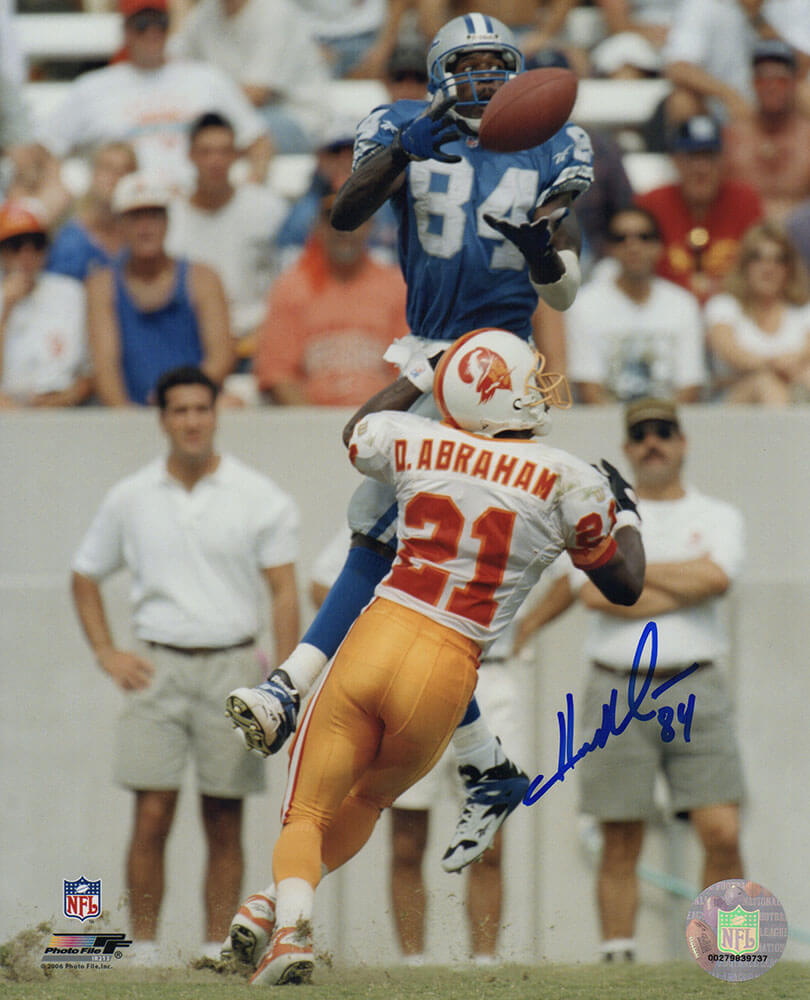 Herman Moore Autographed Detroit Lions Jumping Catch vs. Bucs 8x10 Photo-Powers Sports Memorabilia