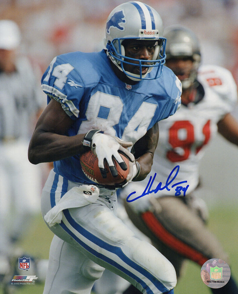 Herman Moore Autographed Detroit Lions Blue Jersey Close Up Action 8x10 Photo-Powers Sports Memorabilia