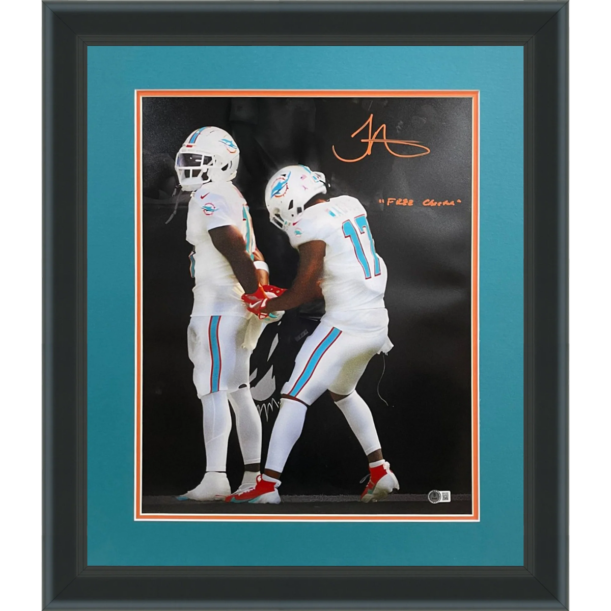 Autographed Tyreek Hill Miami Dolphins (Handcuffs Celebration Spotlight) Deluxe Framed 16x20 Photo w/ "Free Cheetah" - Beckett-Powers Sports Memorabilia