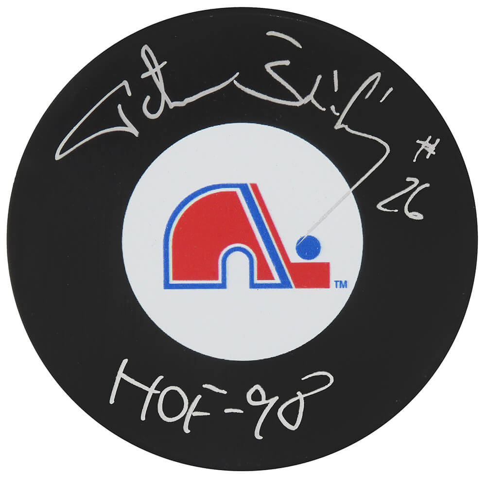 Peter Stastny Autographed Quebec Nordiques Team Logo Hockey Puck with HOF 98-Powers Sports Memorabilia