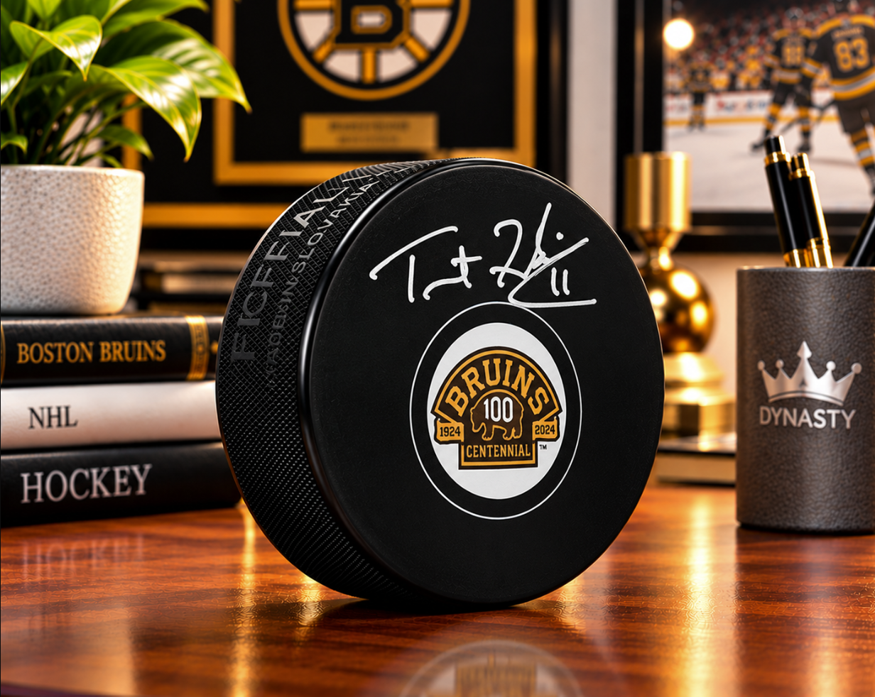 Trent Frederic Signed Boston Bruins 100th Anniversary Hockey Logo Puck-Powers Sports Memorabilia