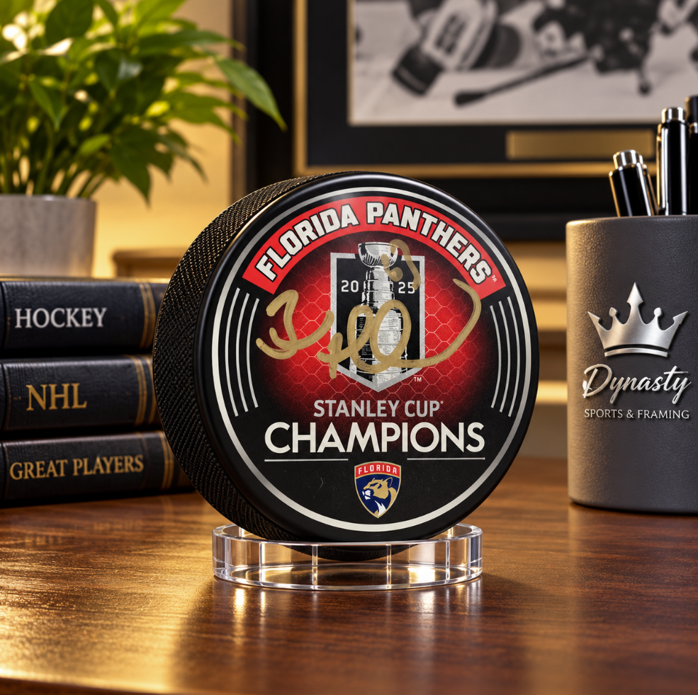 Brad Marchand Florida Panthers Stanley Cup Champions Logo Puck-Powers Sports Memorabilia