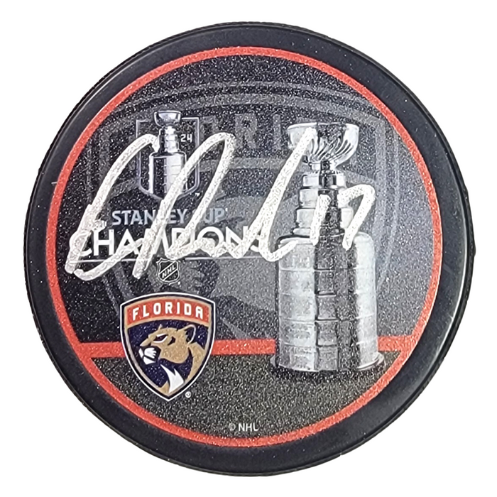Evan Rodrigues Signed Florida Panthers 2024 Stanley Cup Champions Hockey Puck - Beckett-Powers Sports Memorabilia