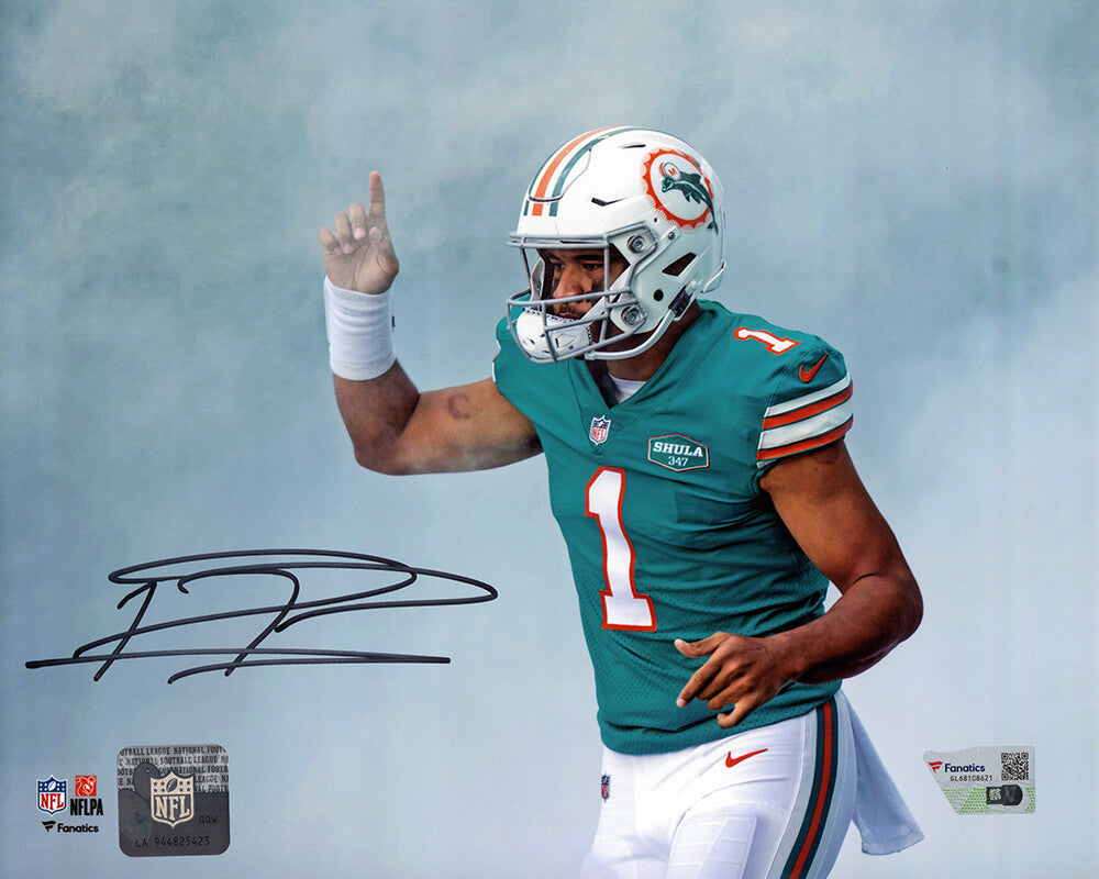 Tua Tagovailoa Autographed Miami Dolphins Teal Jersey Pointing 8x10 Photo-Powers Sports Memorabilia