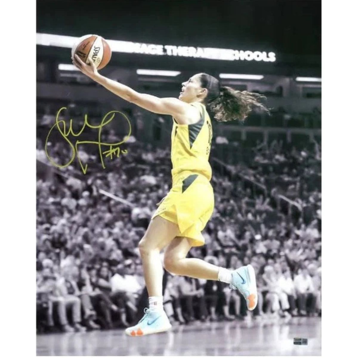 Sue Bird Seattle Storm Signed 16x20 Spotlight Layup Photo Signed in Yellow-Powers Sports Memorabilia