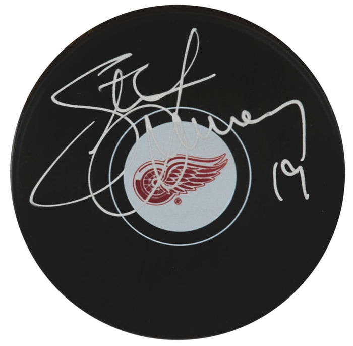 Steve Yzerman Autographed Detroit Red Wings Logo Hockey Puck - (Beckett)-Powers Sports Memorabilia