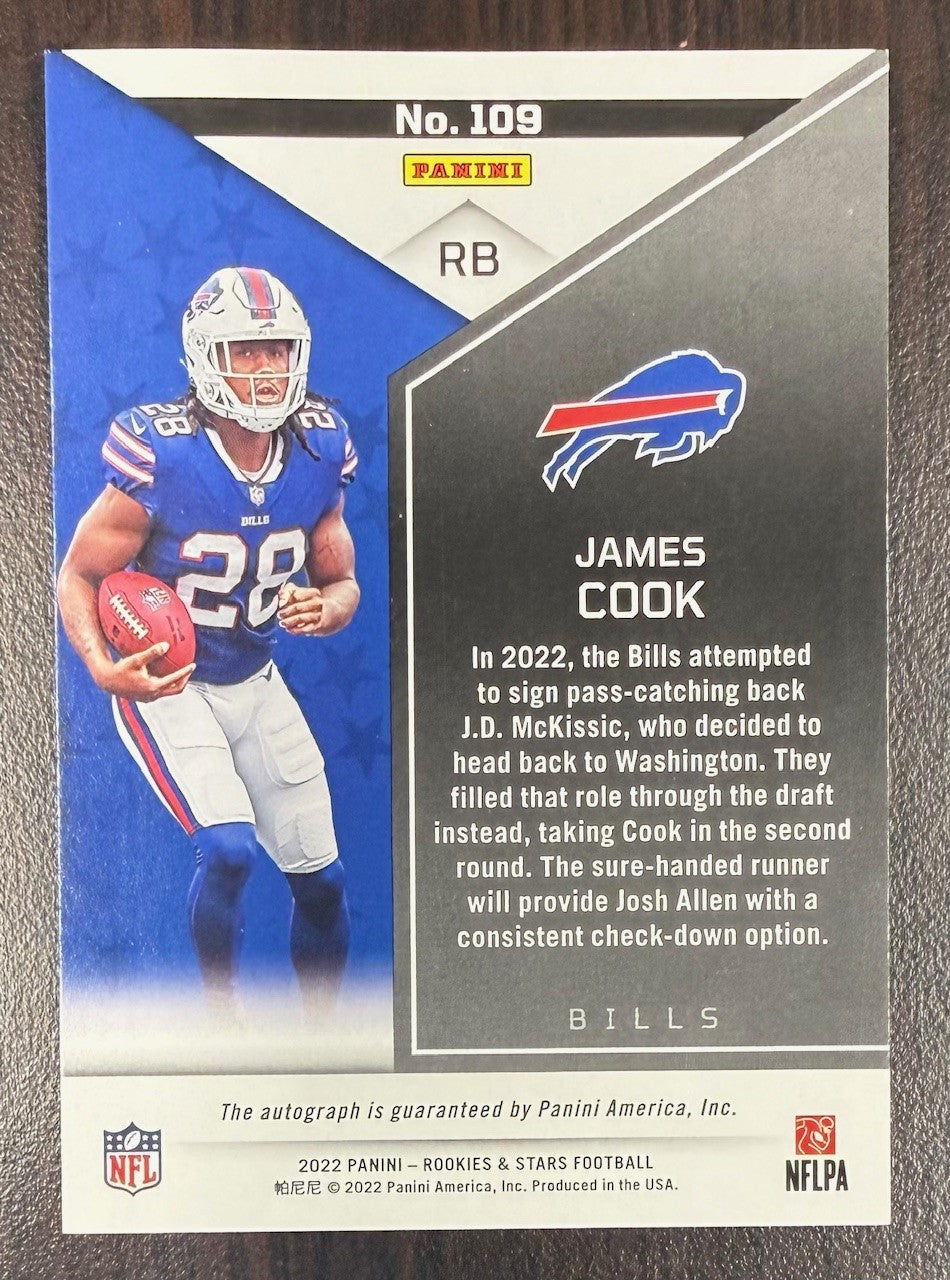 James Cook 2022 Panini Rookies and Stars Orange Signed Football Rookie Card Auto #109 Serial #91/125-Powers Sports Memorabilia