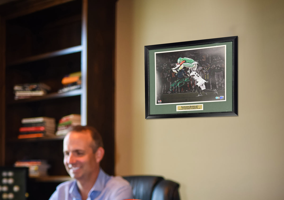 Saquon Barkley Autographed Philadelphia Eagles Reverse Hurdle Signed 16x20 Framed Football Photo Beckett Authenticated COA Green-Powers Sports Memorabilia