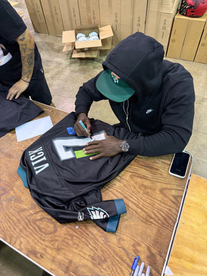 Michael Vick Autograph Signing-Powers Sports Memorabilia