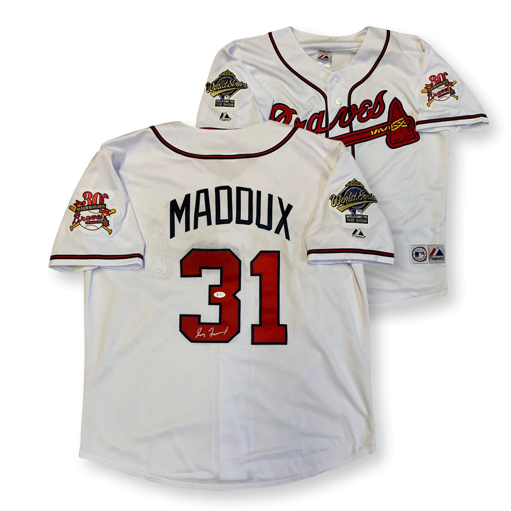 Greg Maddux Autographed and Framed White Braves Jersey